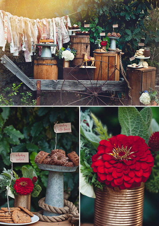 Rustic dessert display with cookies flowers and barrels
