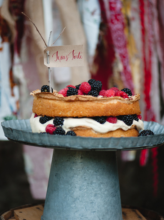 Delicious Texas Torte cake with berries on a cake stand