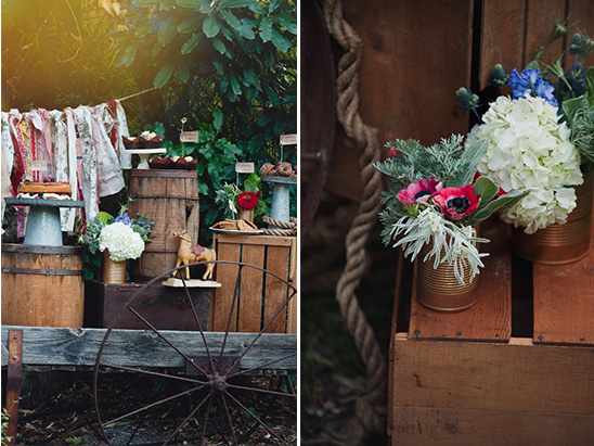 Rustic outdoor dessert display with flowers and wooden accents