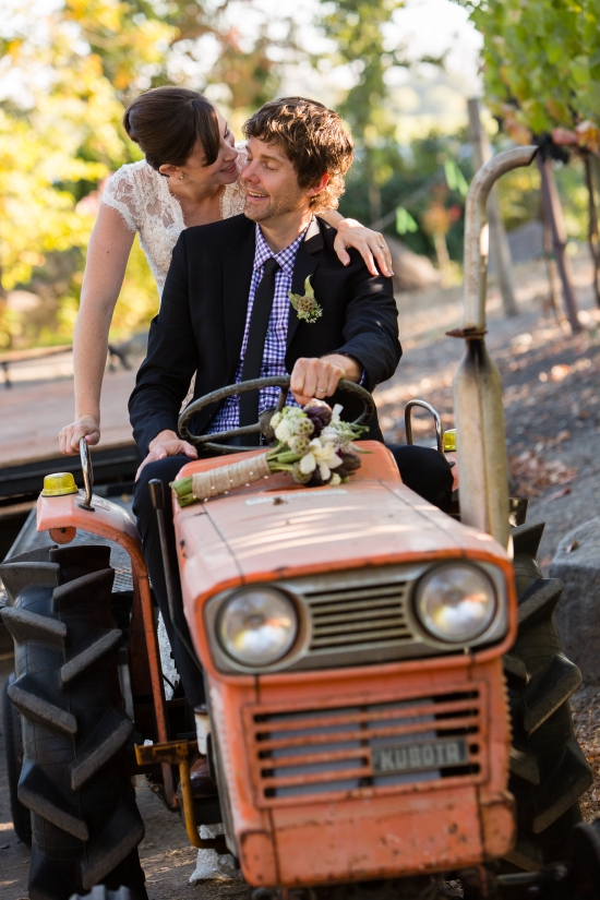 Couple on tractor wedding day