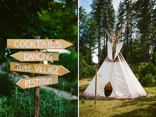 Wooden signs direct guests toward cocktails, dancing, tepee village and restrooms