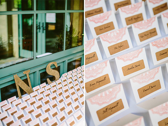 Wedding name cards on display with floral design and letters