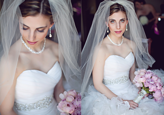 Elegant bride in wedding dress with bouquet and veil