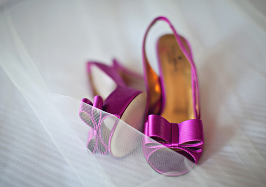 Elegant pink bow heels on a wedding day, close-up shot