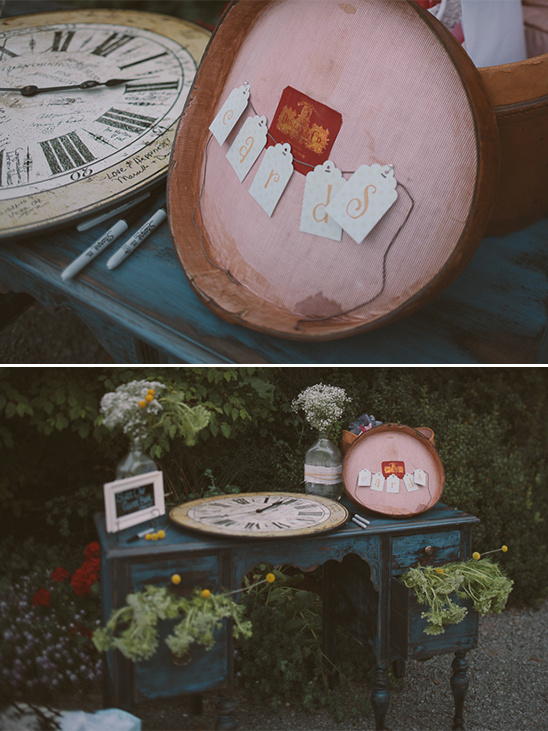 Vintage clock and decor on blue table, whimsical wedding theme
