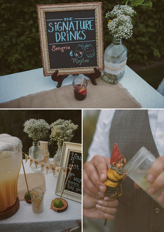 Signature drinks station with sangria, mojitos, and lemonade