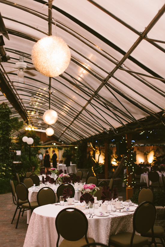Elegant wedding reception venue decorated with floral arrangements
