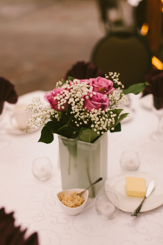 Elegant table setting with pink roses and small details