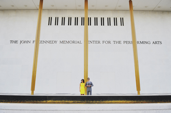 Couple poses in front of Kennedy Center, Washington DC