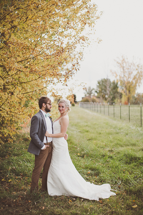 Happy couple on their wedding day surrounded by nature