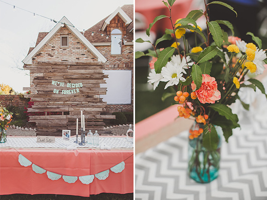 Rustic wedding decor with flowers, table, and the forever sign