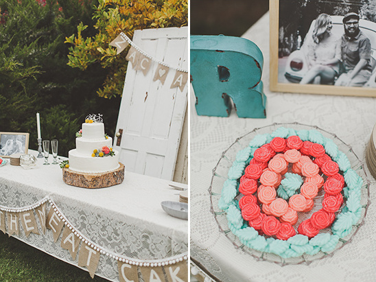 Rustic wedding dessert table with cake and candy