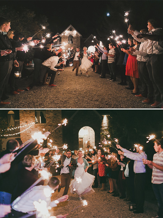 Bride and groom exit with sparklers at wedding reception