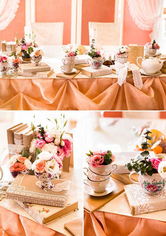 Floral teacup centerpieces on vintage books