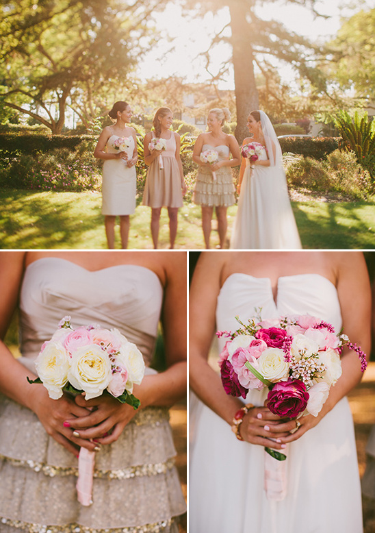Bride and bridesmaids holding bouquets at an outdoor wedding