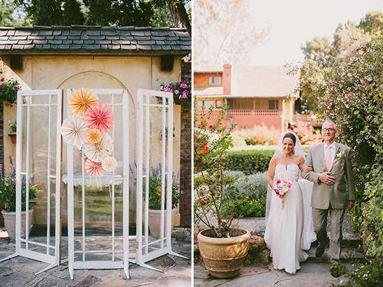 Bride and father walking down the aisle at a garden wedding