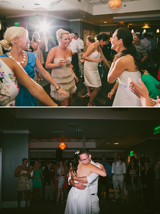 Joyful wedding guests dancing and celebrating a happy couple