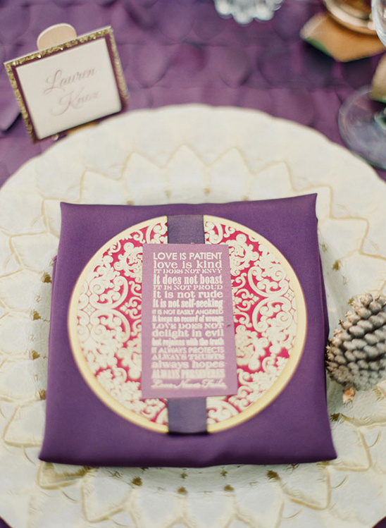 Elegant wedding place setting with a Love quote card and name tag