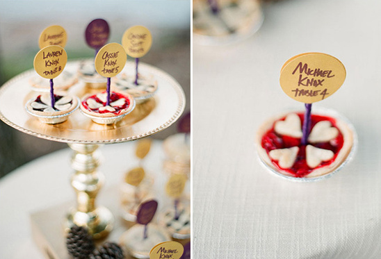 Mini pies with name tags used as wedding reception place settings