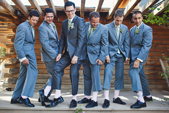 grooom and his men with pink socks