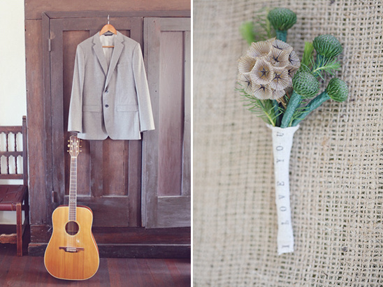 Grooms wedding attire details with a guitar and floral boutonniere