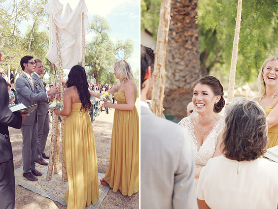 Outdoor wedding ceremony with happy bride and bridesmaids