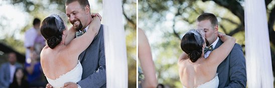 Happy bride and groom embrace at wedding ceremony