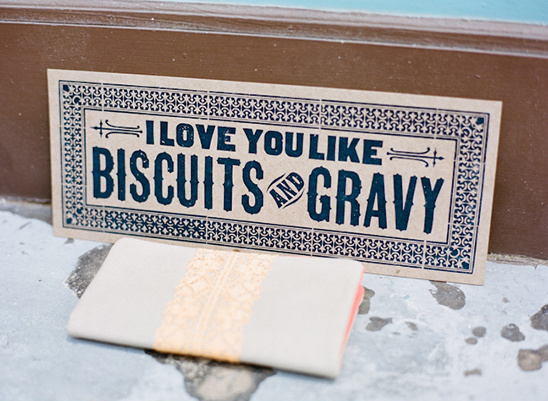 Sign that says I love you like biscuits and gravy with gift