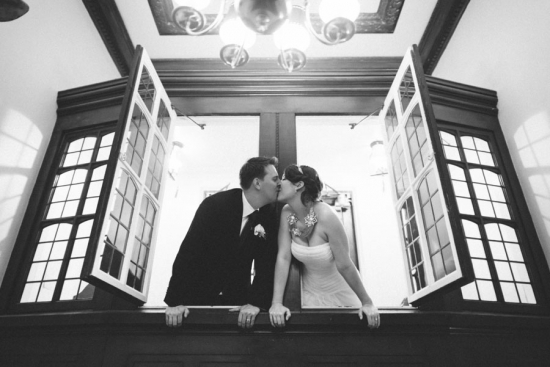 Couple kissing, wedding photo, historical building