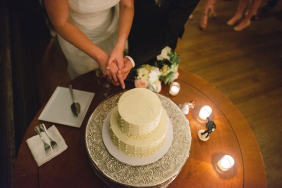 Bride and groom cutting their beautiful wedding cake