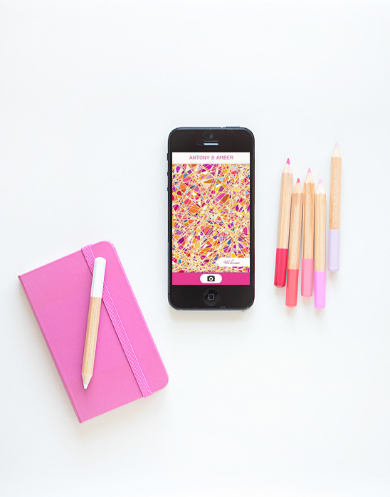 Colorful design on phone, stationery, and pencils