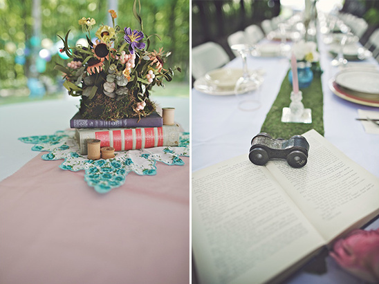 Elegant wedding table with vintage books and floral decor