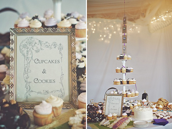 Cupcakes and cookies at a beautifully decorated dessert table