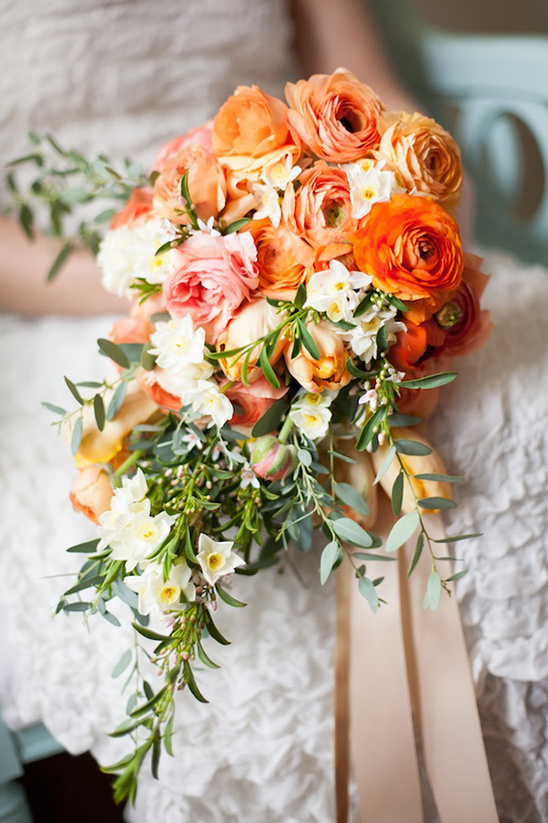 Peach and orange cascade wedding bouquet with ribbon