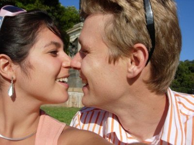 Romantic couple sharing a tender moment outdoors