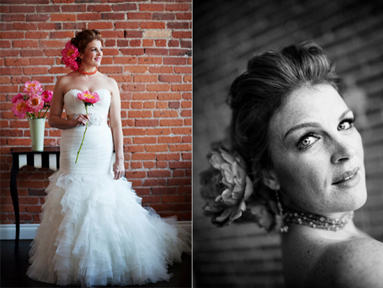 Elegant bride in a ruffled wedding dress holding a pink flower