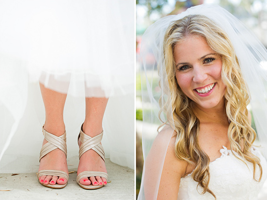 Bride with a veil and beautiful sandals on her wedding day