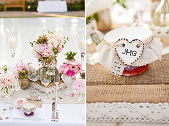 Elegant wedding table setting with pink flowers and favors