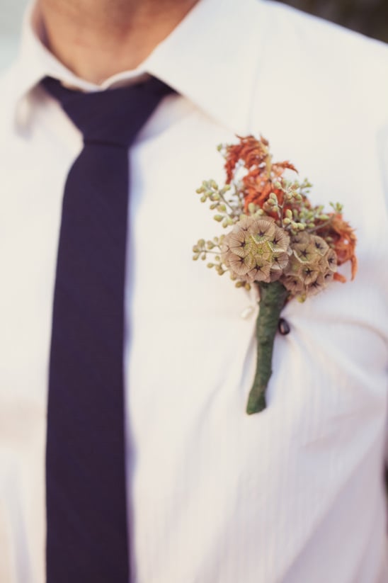 pink and peach groomsmen boutonniere