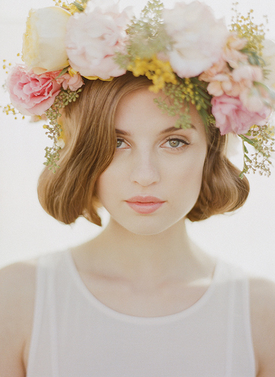 Beautiful woman with flower crown, romantic bridal portrait