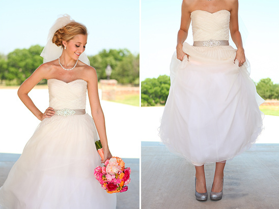 Bride in strapless tulle wedding gown holding bouquet