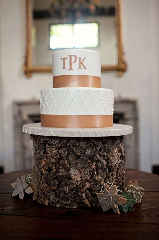 white and brown wedding cake by It's All about the Cake