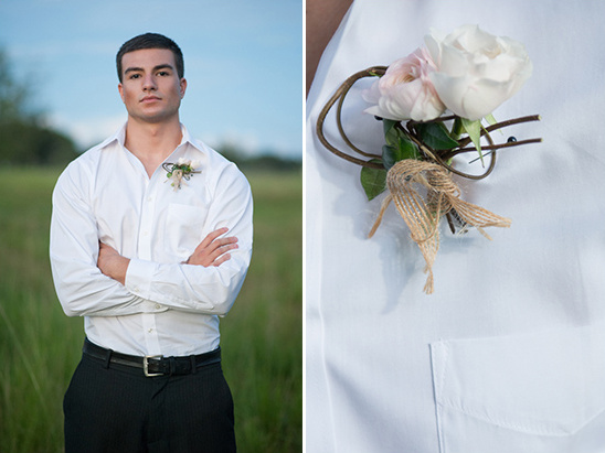 Groom in white shirt with a boutonniere, posing for a portrait