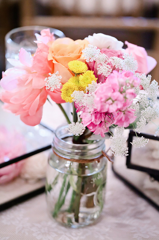 spring wedding florals in mason jars