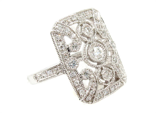 Elegant diamond ring with intricate openwork design and sparkle