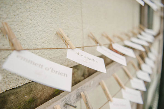 Wedding seating chart with clothespins and name cards
