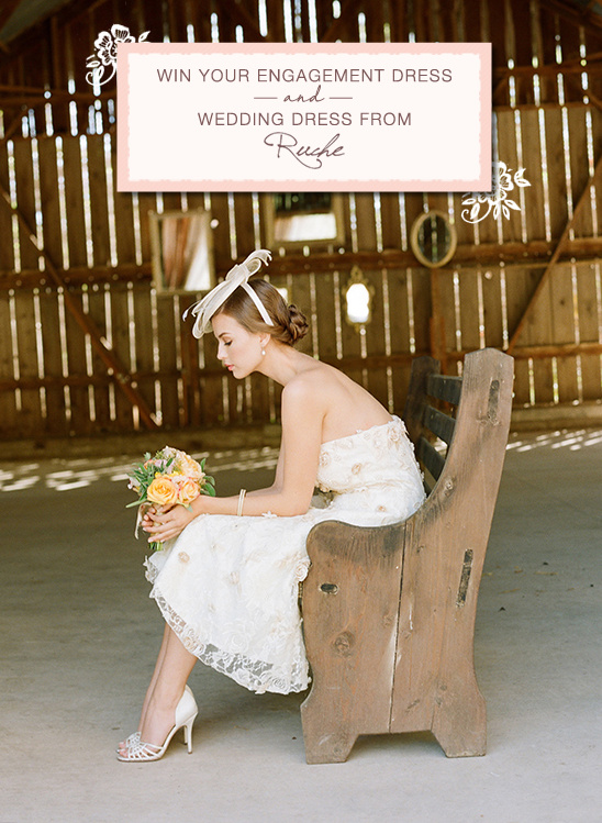 Bride on wooden bench holds bouquet in barn setting