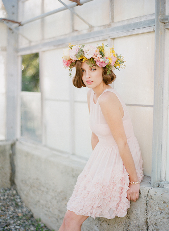 Woman in pink dress with flower crown