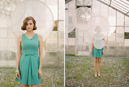 Woman in teal dress, lace decor