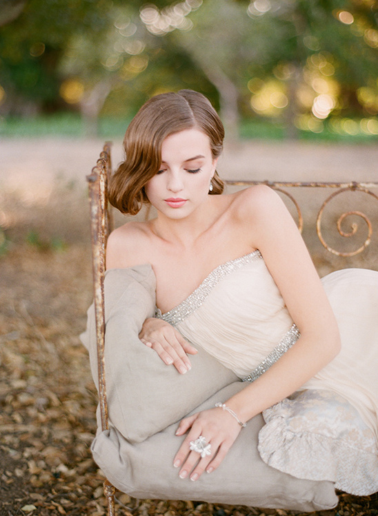 Elegant bride in a light beige wedding dress